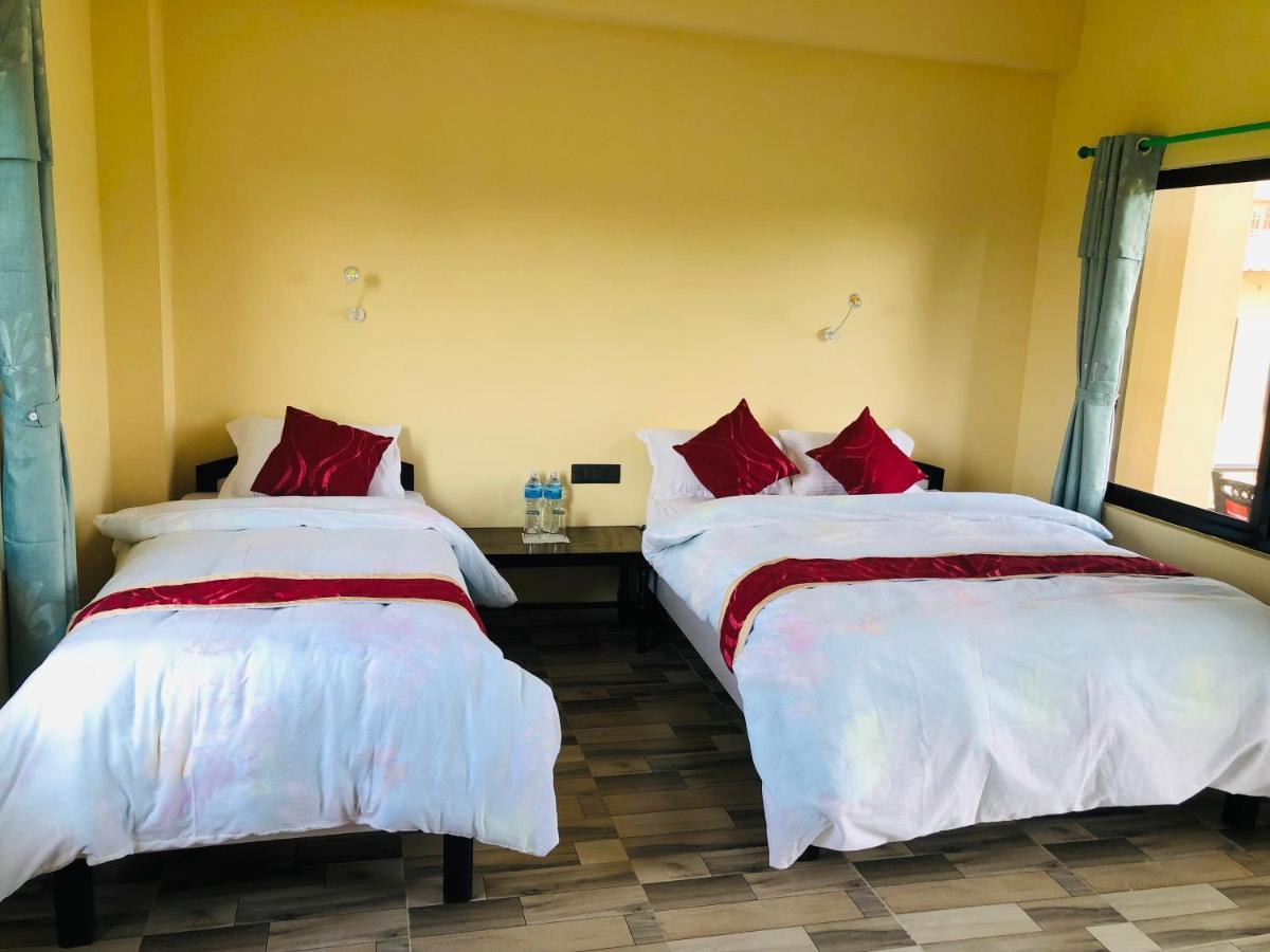 Hotel Happy Land Chitwan Bagian luar foto